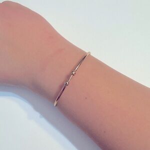 Gold tone cuffed bracelet